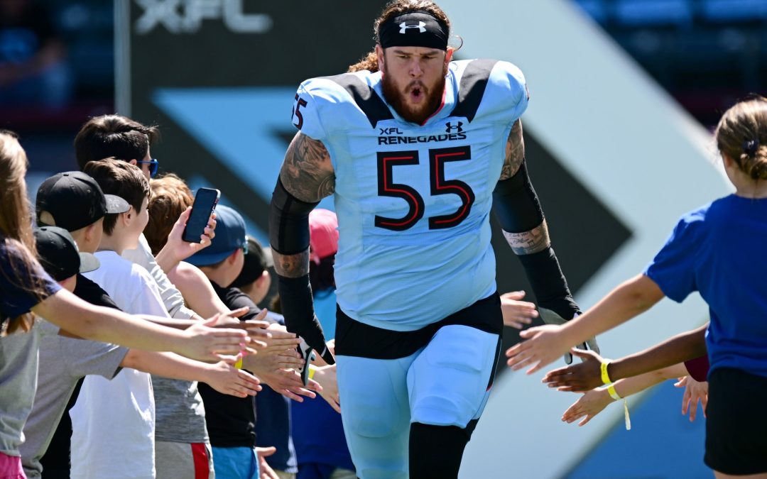 Former ECU lineman Garrett McGhin announces pro football retirement